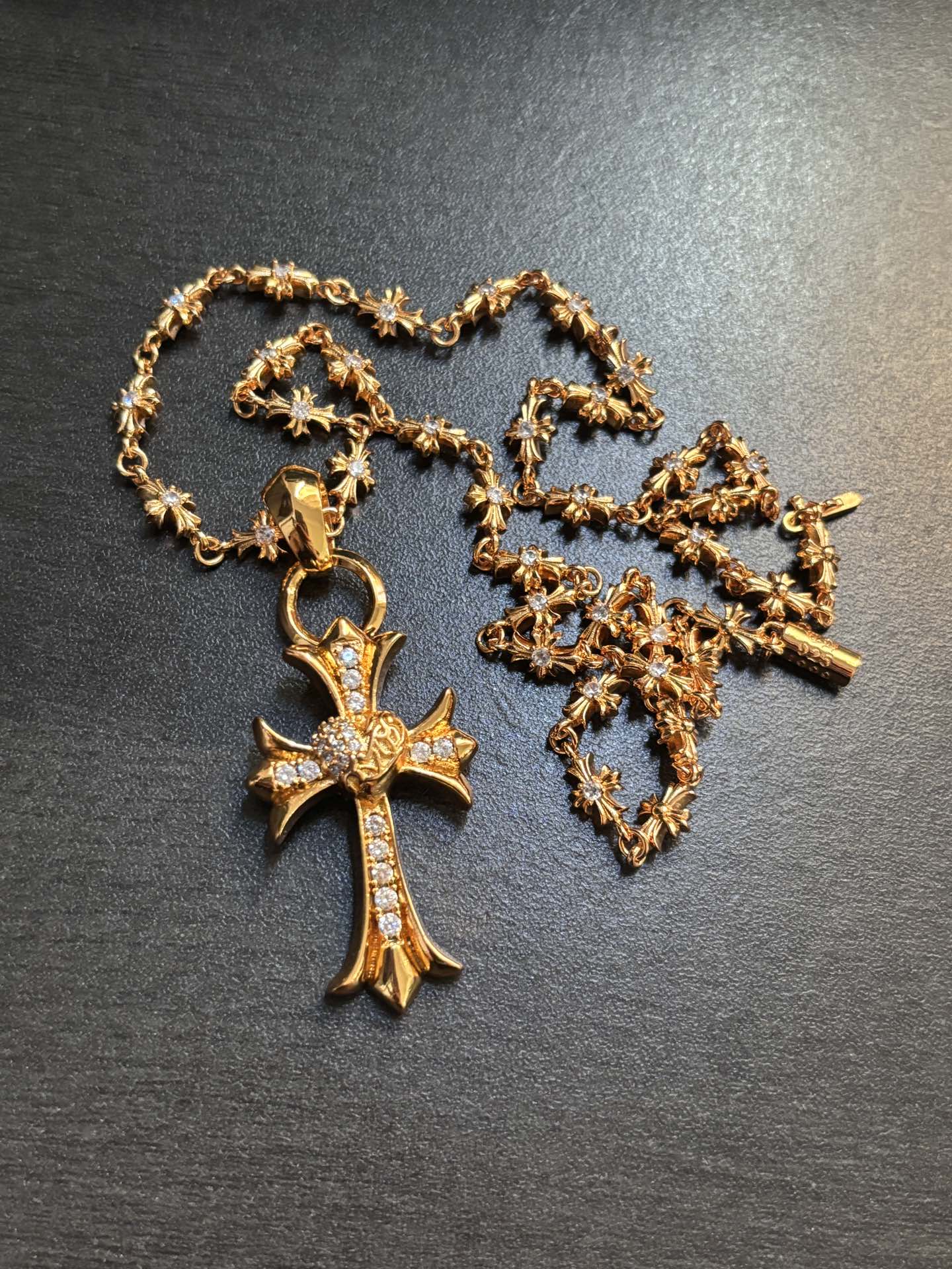 Chrome Hearts Gold Cross Pendant with Gemstones